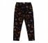 Дитячі спортивні штани для дівчинки ШР 521 Бембі трикотаж чорний-помаранчевий-малюнок